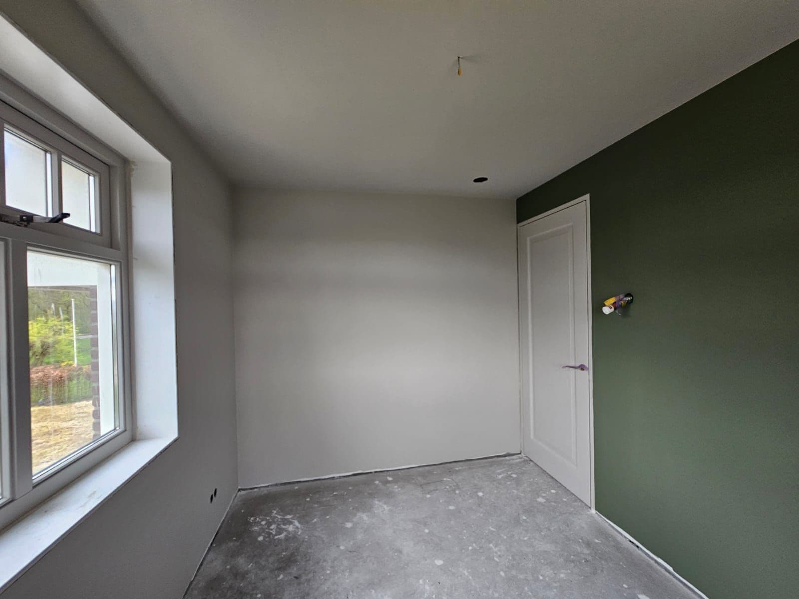 Haal buiten naar binnen met een sfeervolle groene accentwand 2/3